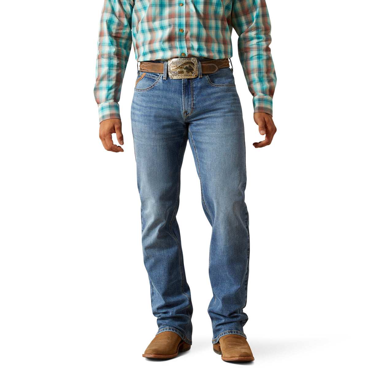 Ariat Men&#39;s M4 Pickett Relaxed Boot Cut Jean. Person wearing a plaid shirt, jeans, and brown shoes on a white background