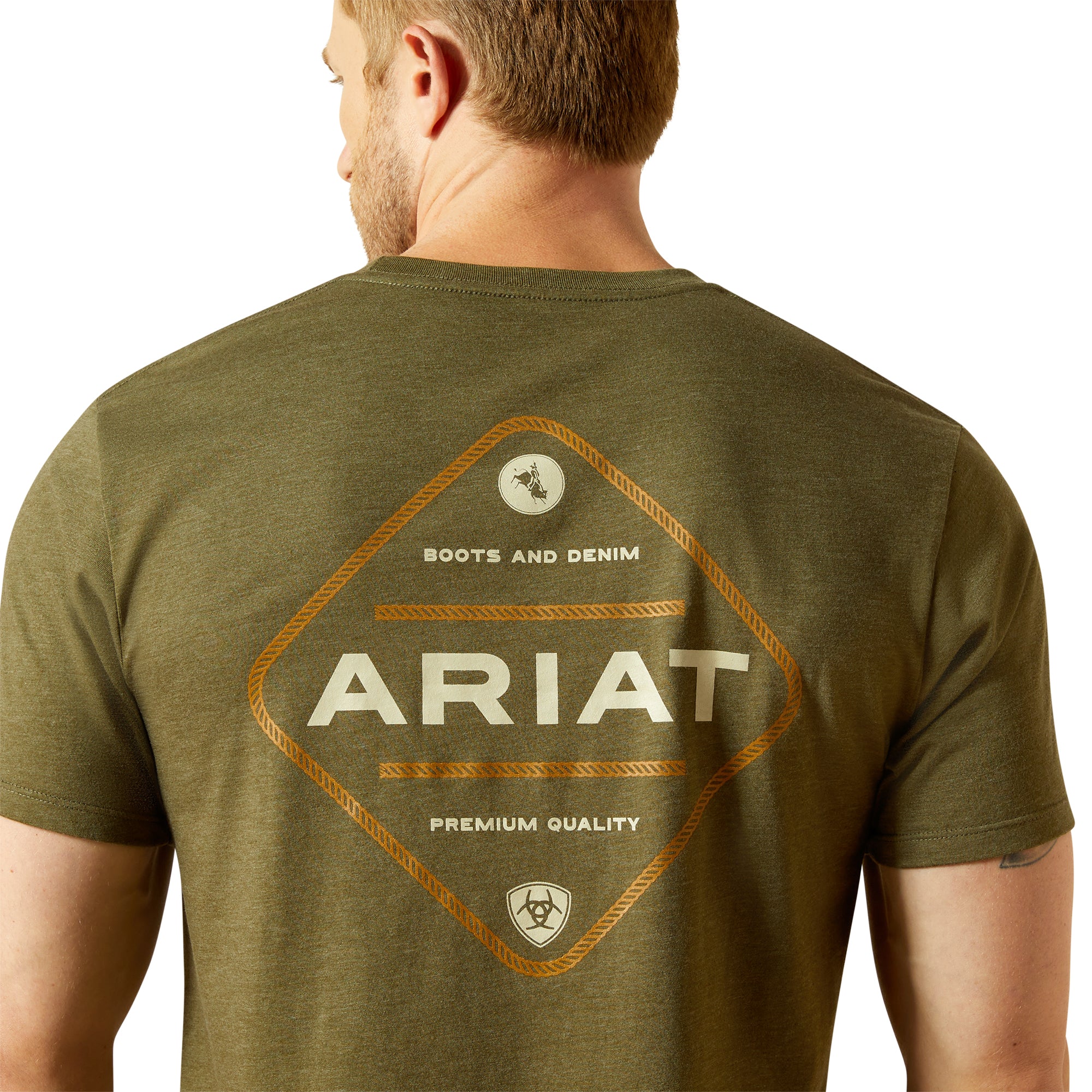 Ariat Men's Roped Diamond T-ShirtMan wearing an olive green Ariat t-shirt with branding on the back. 