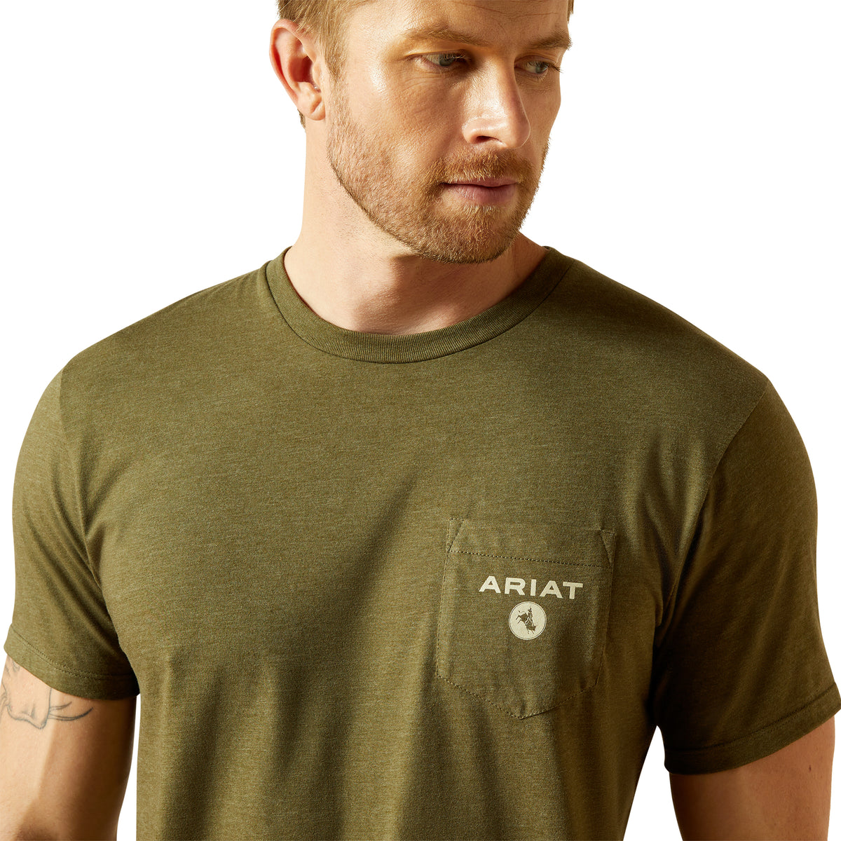 Ariat Men's Roped Diamond T-Shirt. Man wearing an olive green t-shirt with Ariat logo on a white background