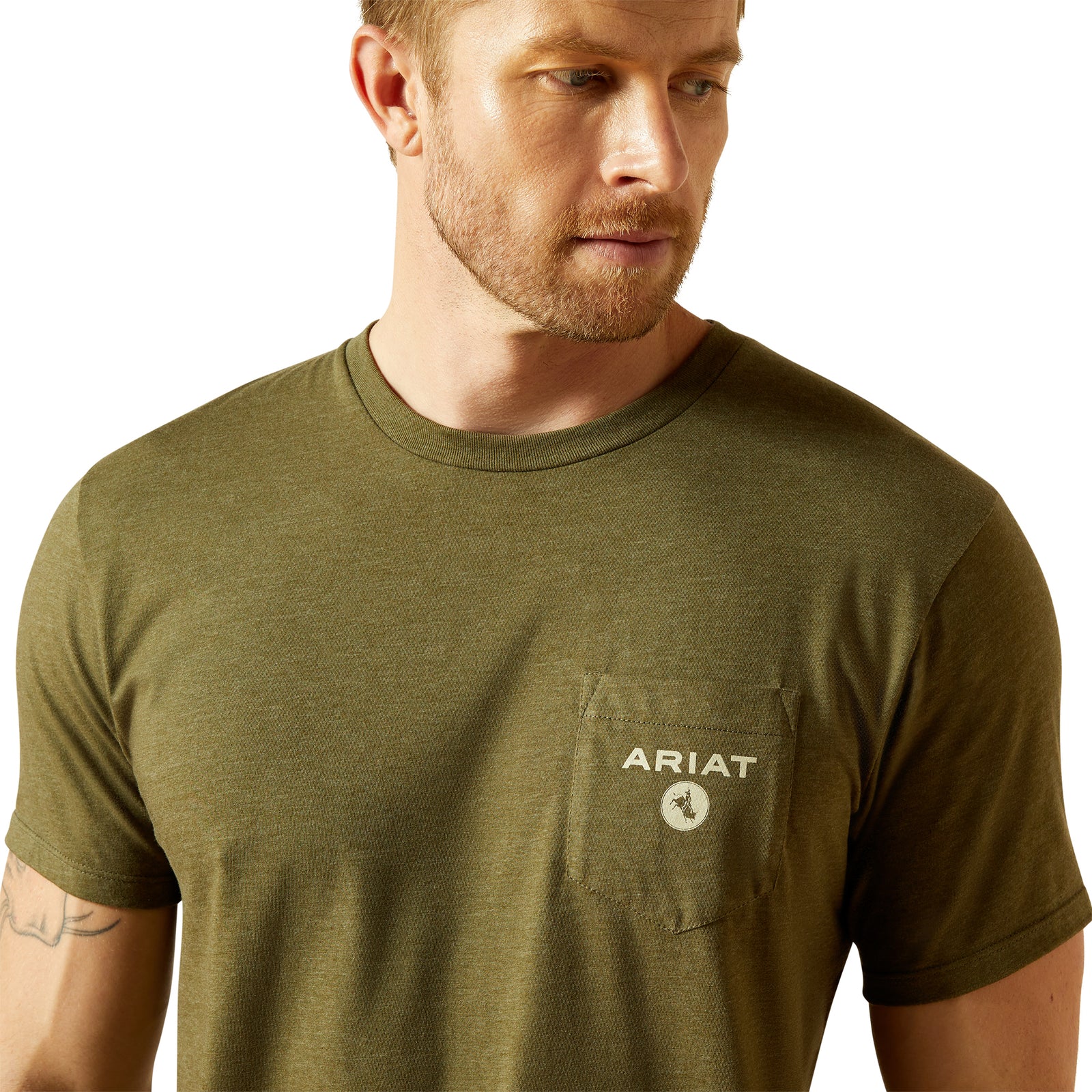 Ariat Men's Roped Diamond T-Shirt. Man wearing an olive green t-shirt with Ariat logo on a white background