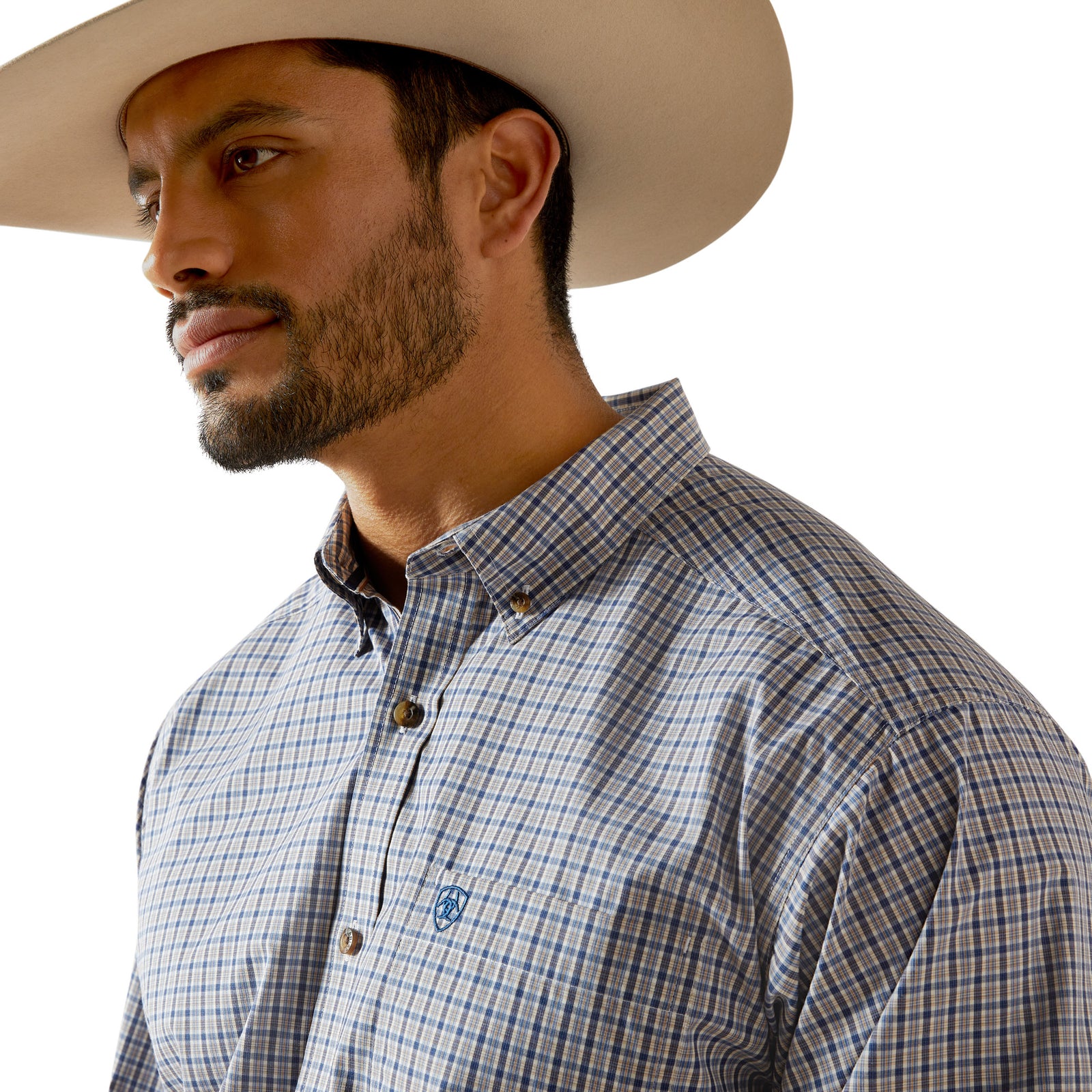 Man wearing a checkered shirt, jeans, and a cowboy hat on a white background