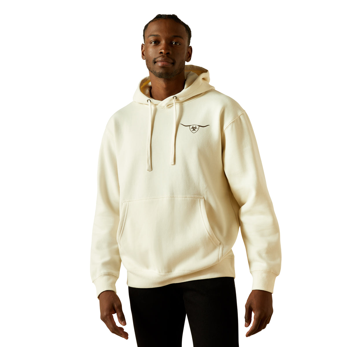 Man wearing a cream hoodie with a logo on a white background