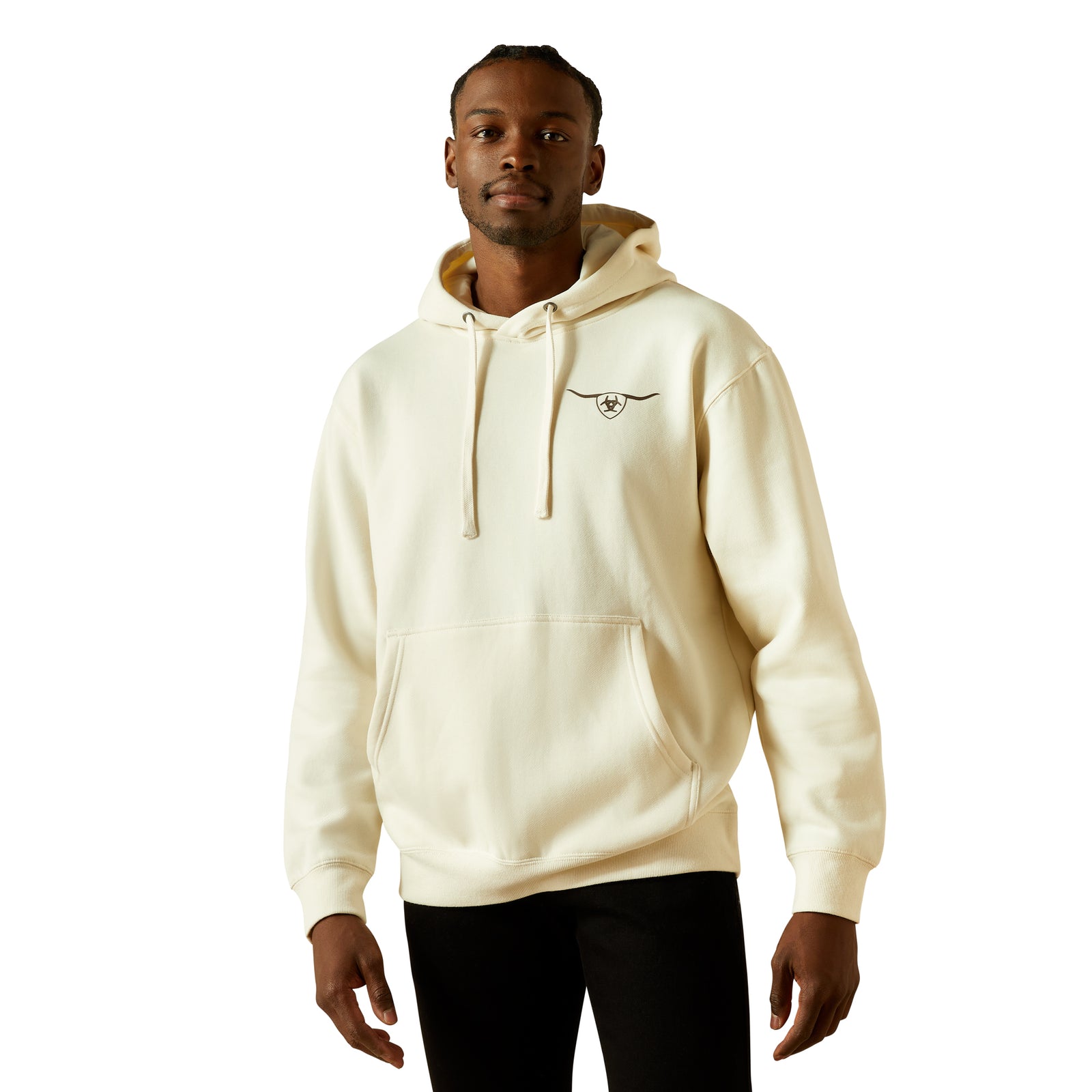 Man wearing a cream hoodie with a logo on a white background