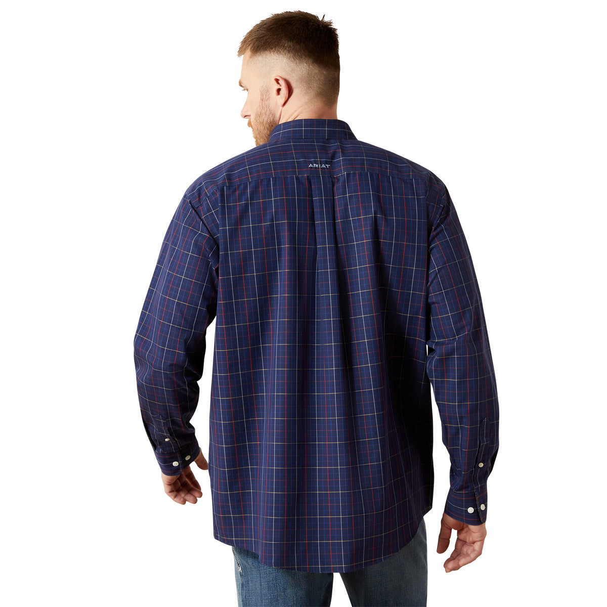 Man wearing a blue plaid shirt on a white background