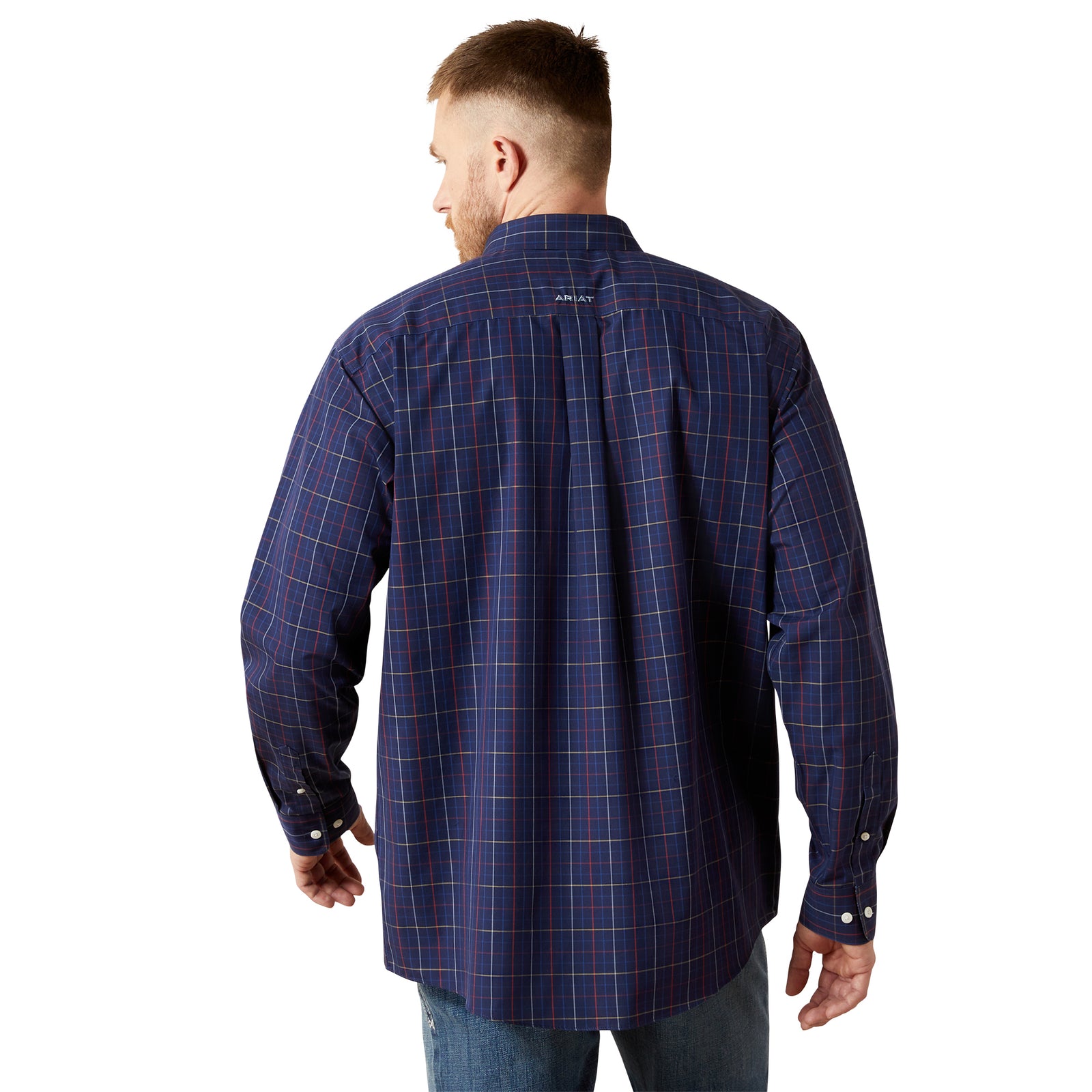 Man wearing a blue plaid shirt on a white background