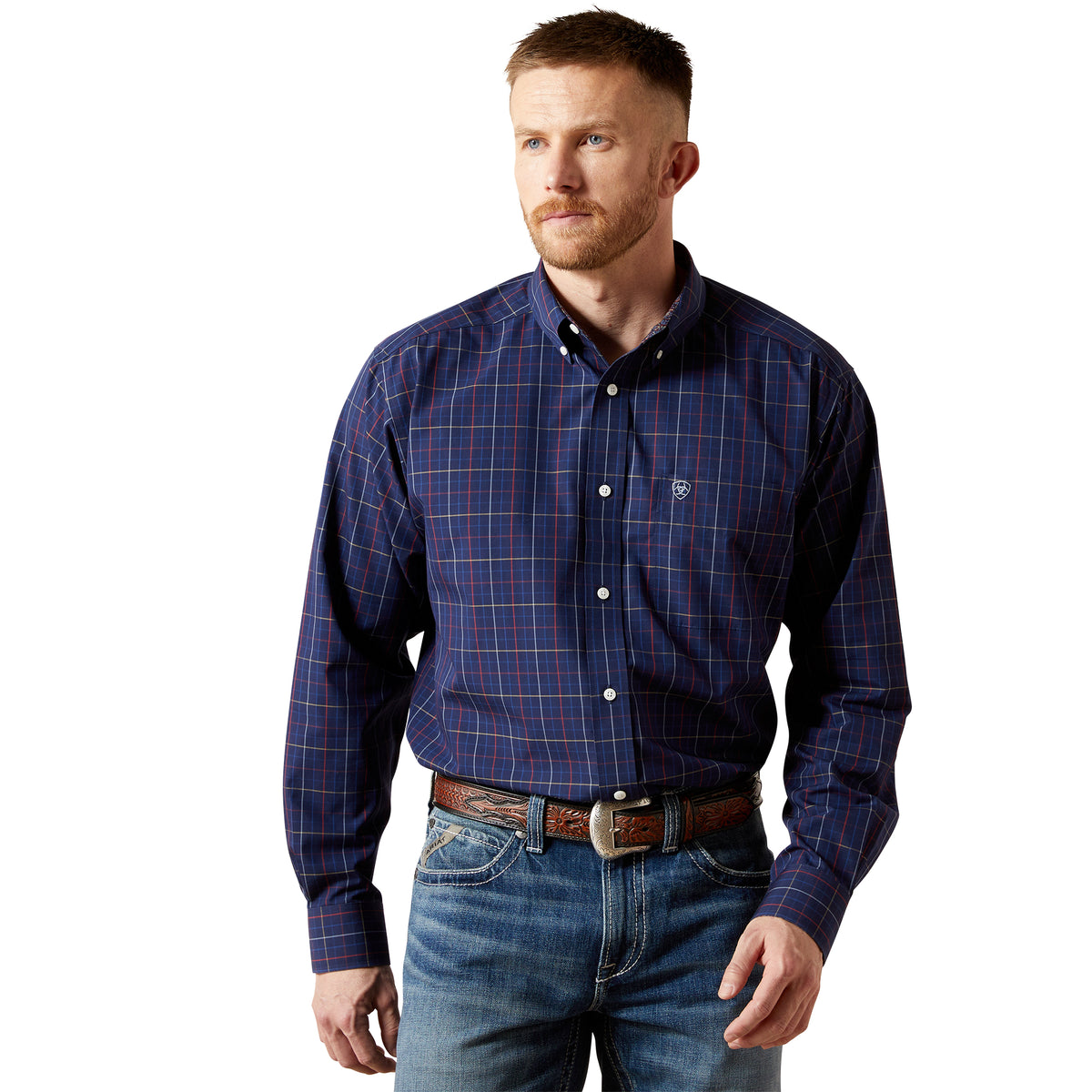 Man wearing a blue plaid shirt and jeans on a white background