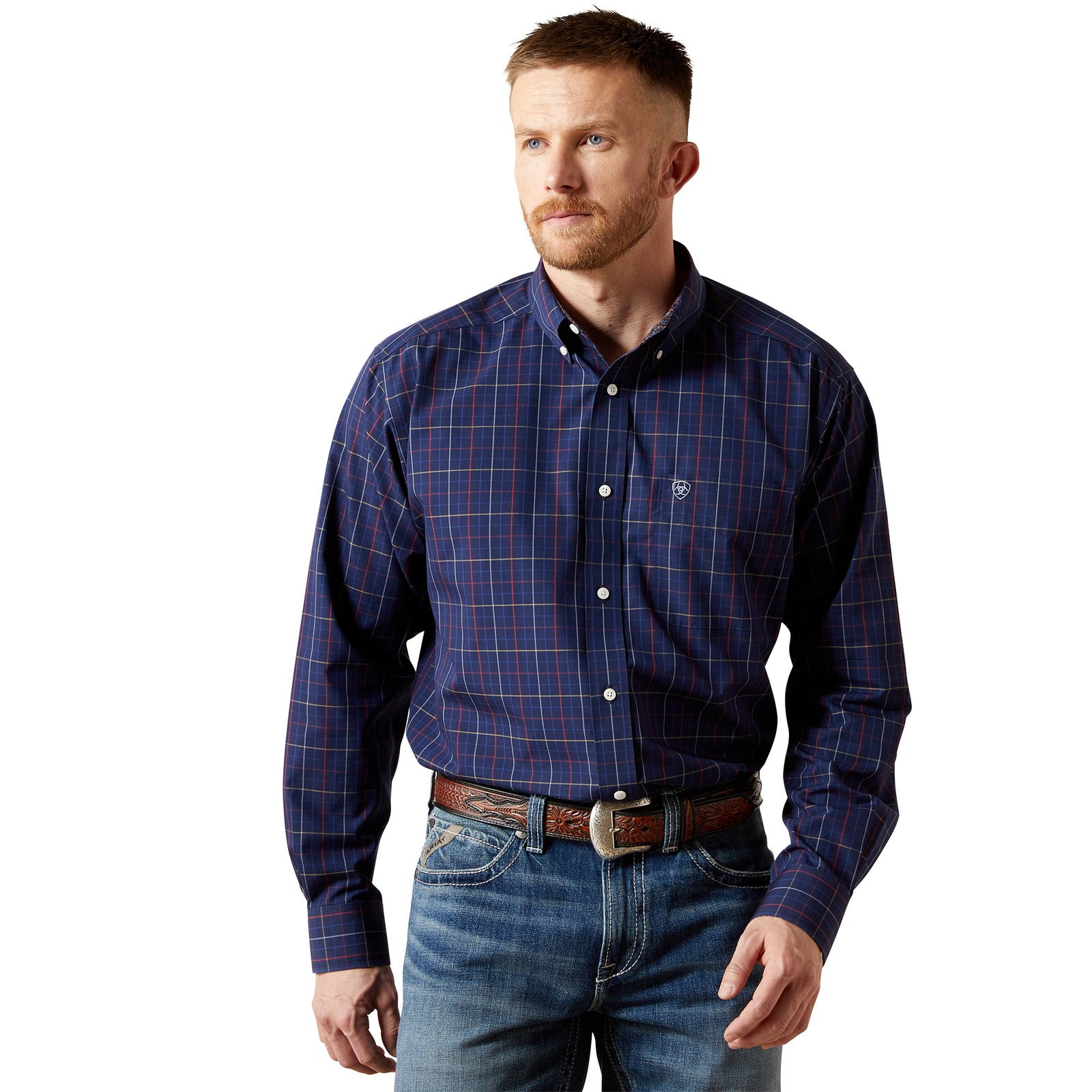 Man wearing a blue plaid shirt and jeans on a white background