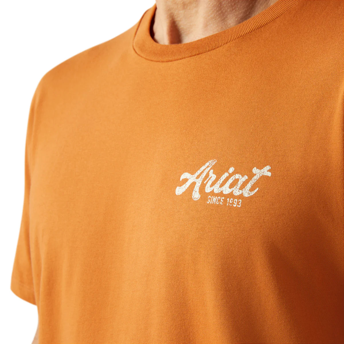 Orange t-shirt with 'Ariat Since 1930' logo on a white background