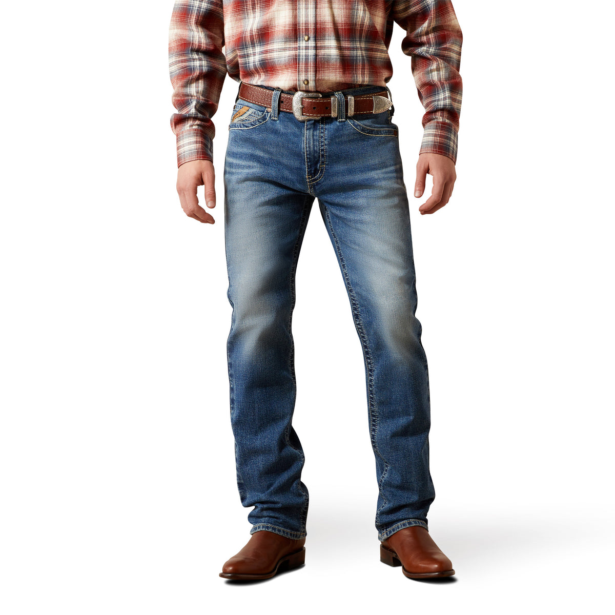 Person wearing blue jeans and a plaid shirt on a white background