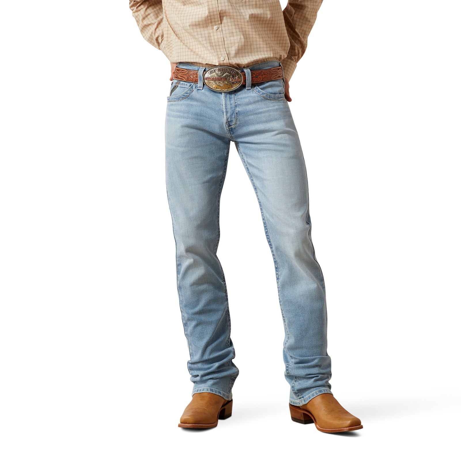 Light blue jeans worn by a person on a white background