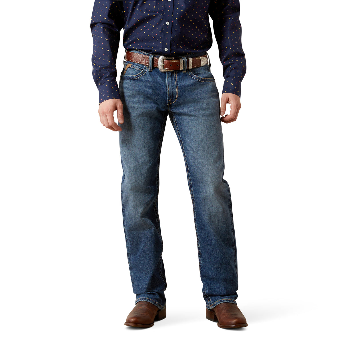 Person wearing a navy button-up shirt, blue jeans, and brown shoes on a white background