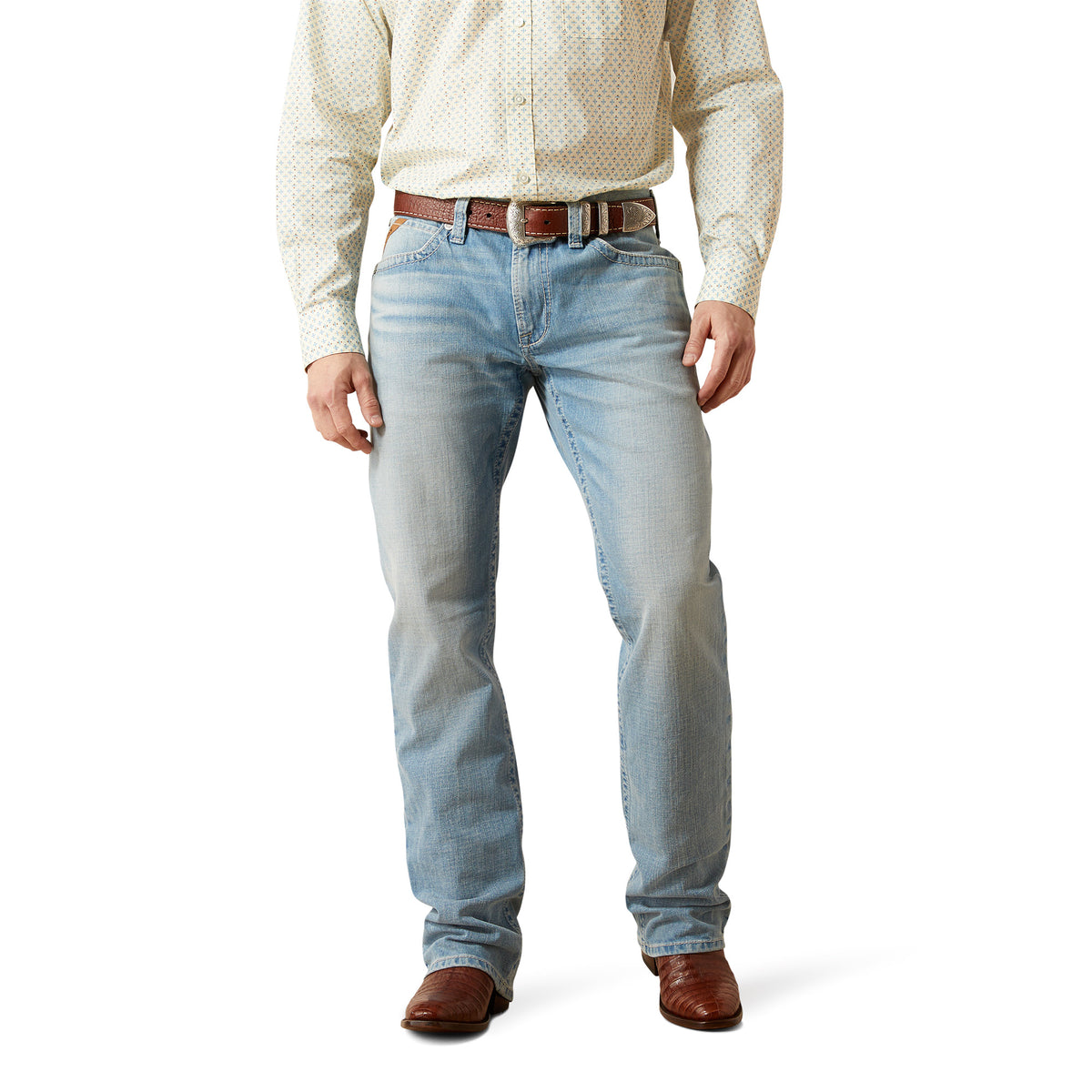 Light blue jeans worn by a person on a white background