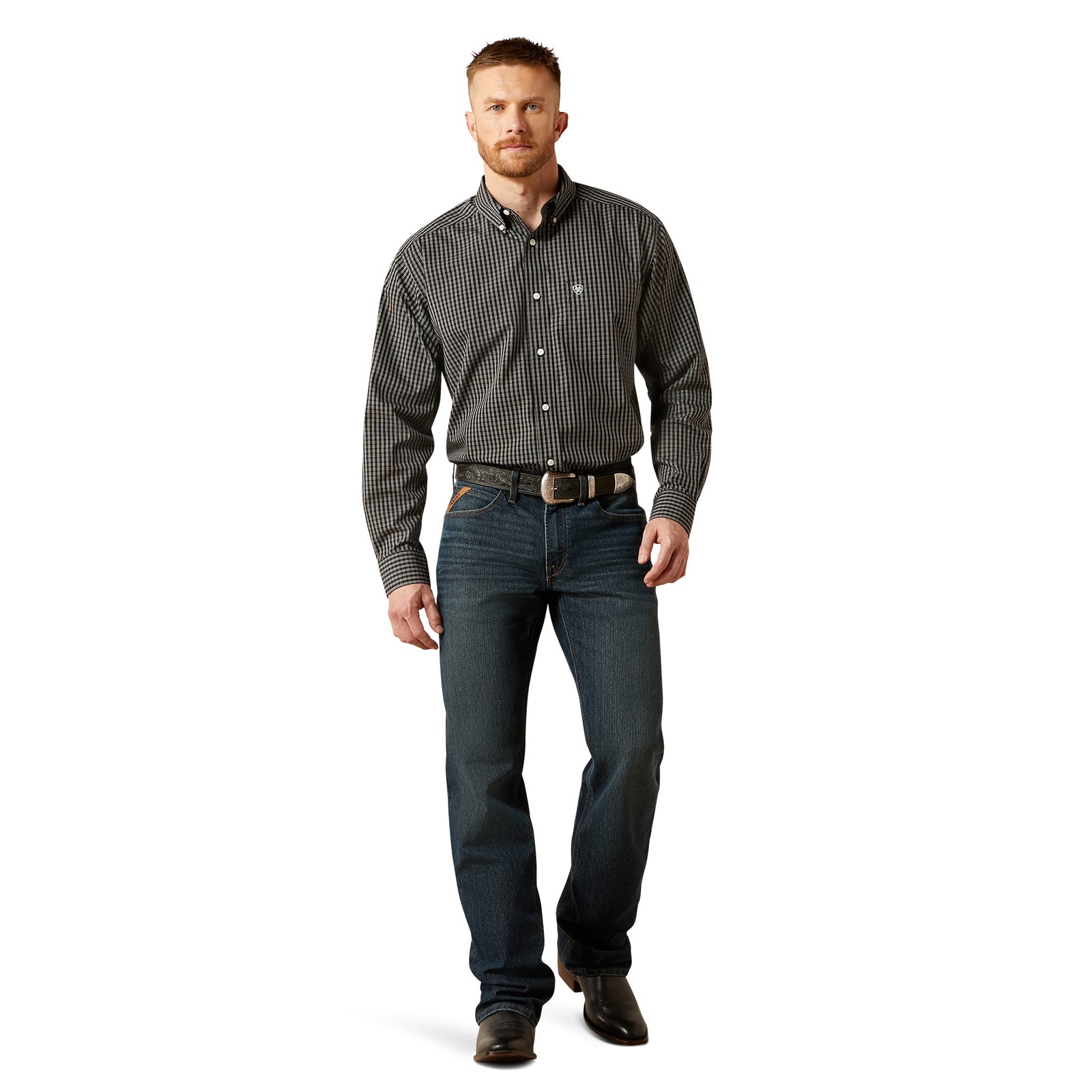 Man wearing a checkered shirt and jeans on a white background