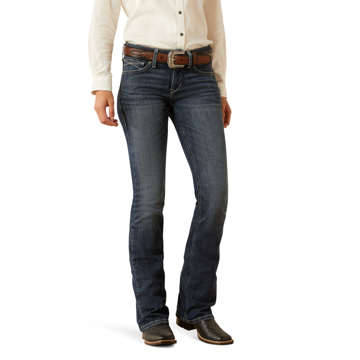 Ariat Women&#39;s Esti Perfect Rise Boot Cut Jean. Person wearing blue jeans and a white shirt on a white background