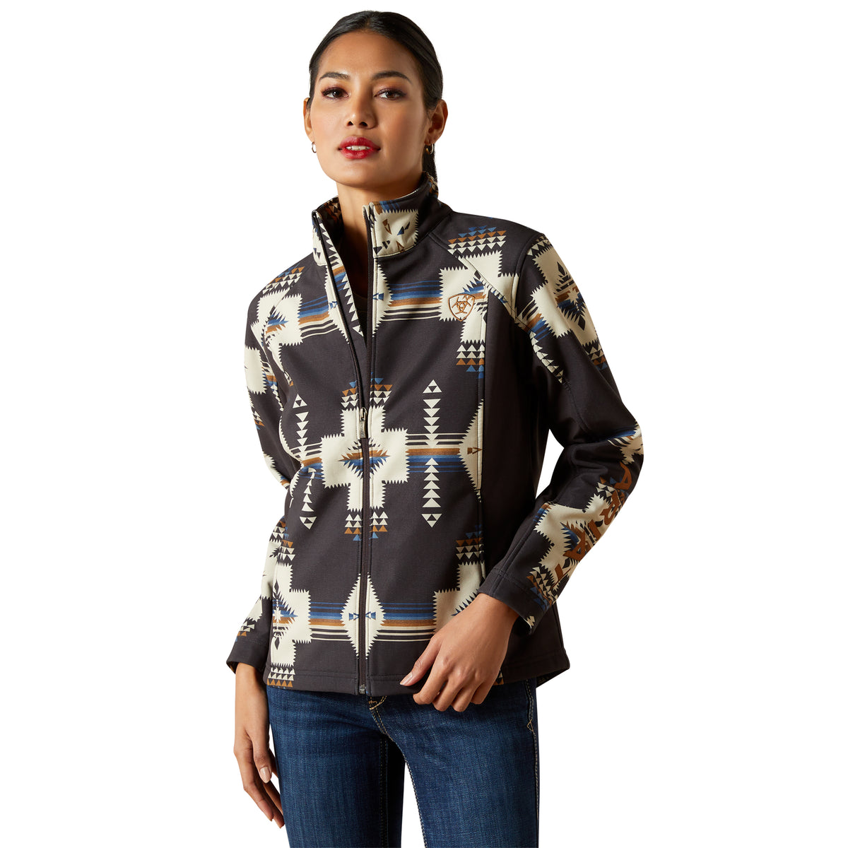 Woman wearing a patterned jacket on a white background