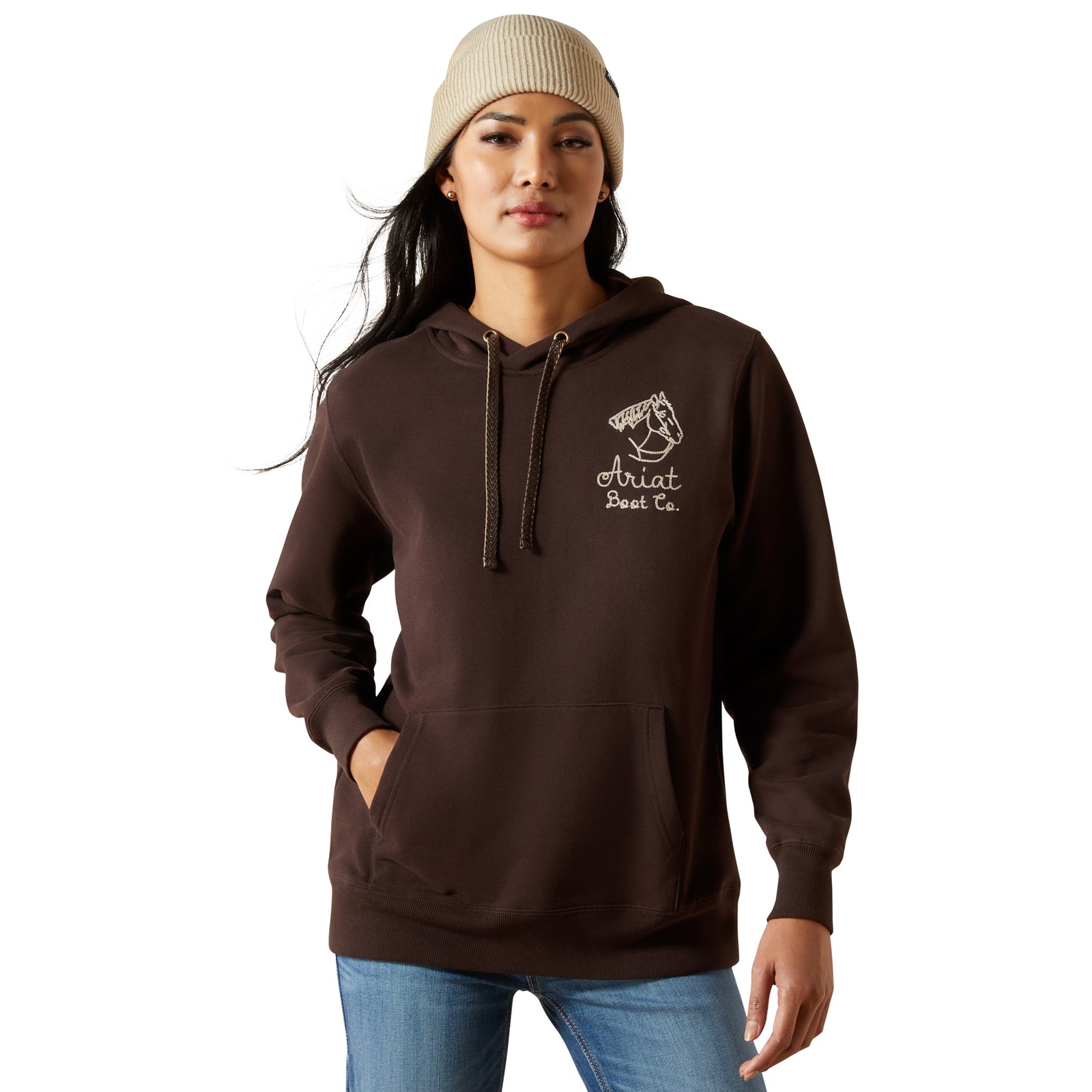 Person wearing a brown hoodie with a logo on a white background