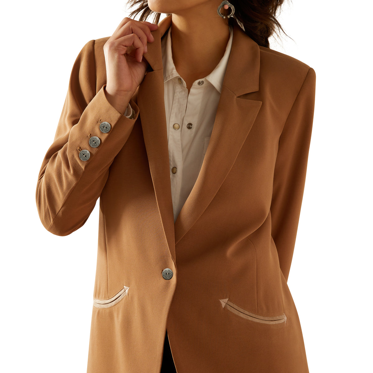 Brown blazer worn by a person on a white background