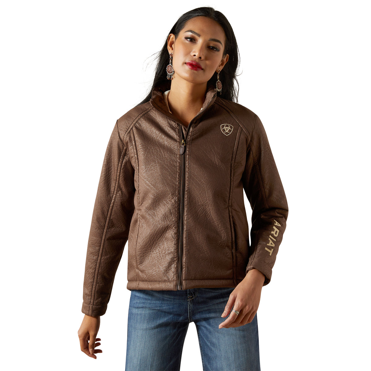 Woman wearing a brown Ariat jacket on a white background