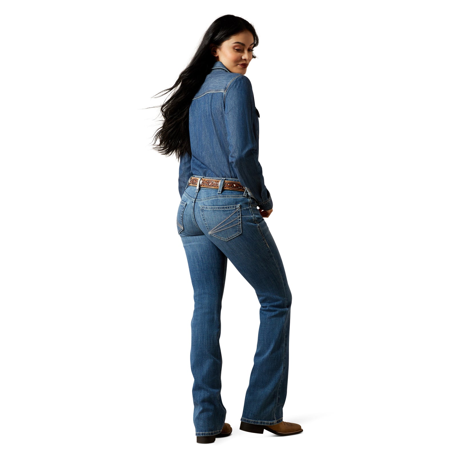 Person wearing blue jeans and a button-up shirt on a white background