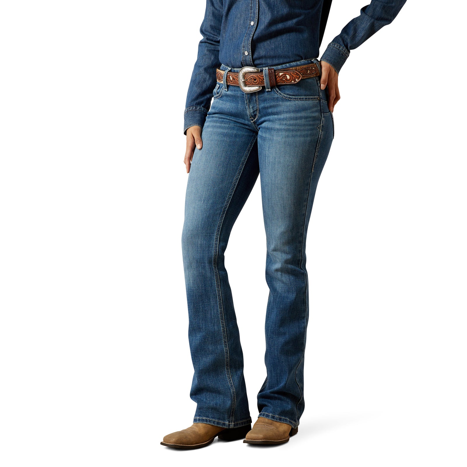 Person wearing blue jeans and a button-up shirt on a white background