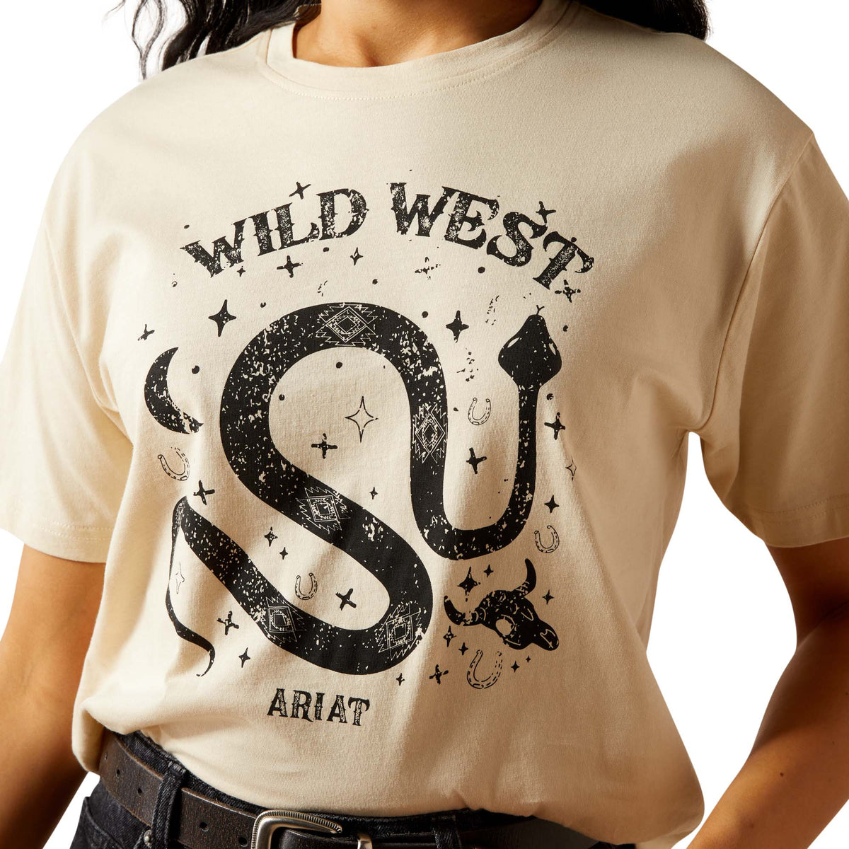 Beige t-shirt with 'Wild West' and 'Ariat' graphic design on a white background