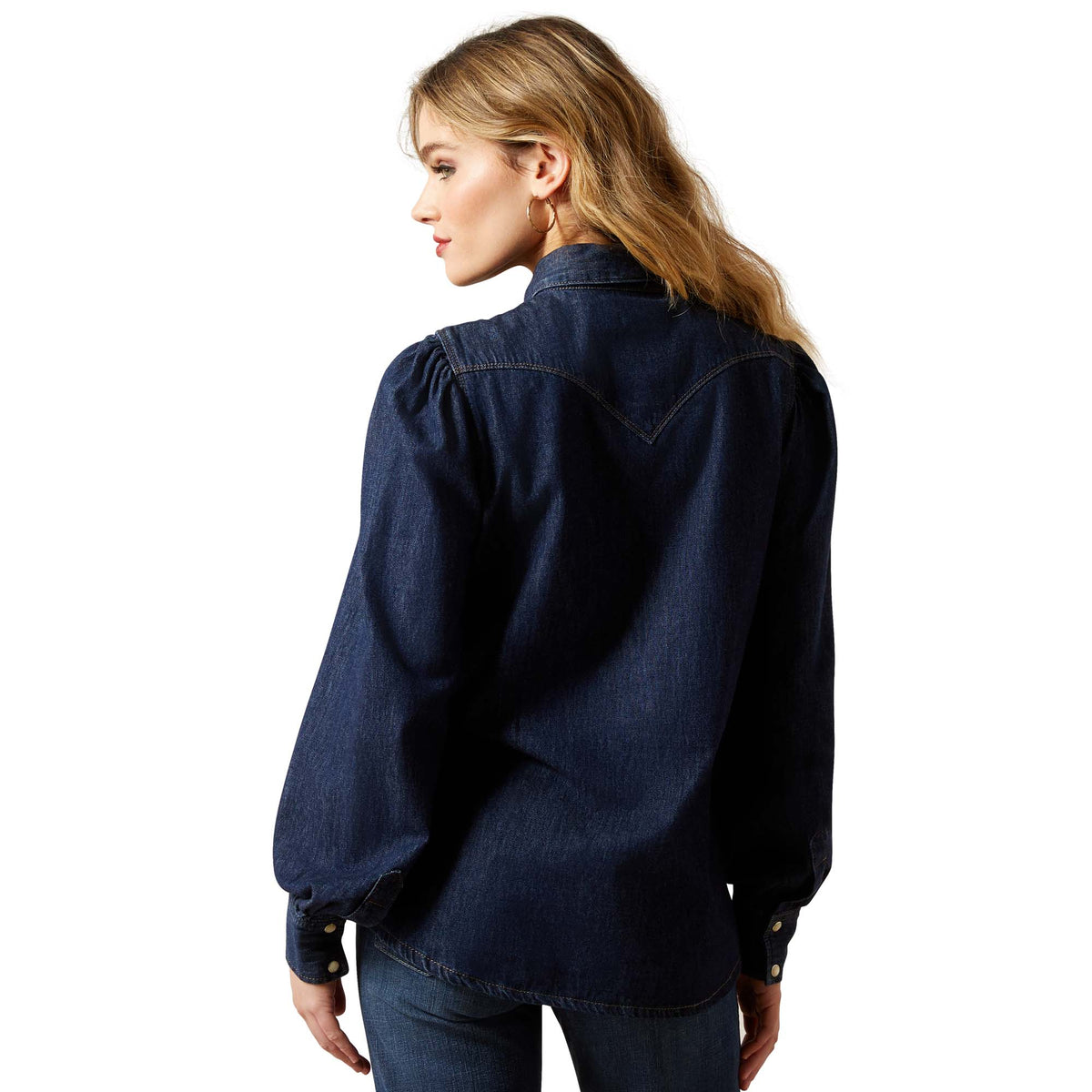 Woman wearing a dark blue denim shirt on a white background