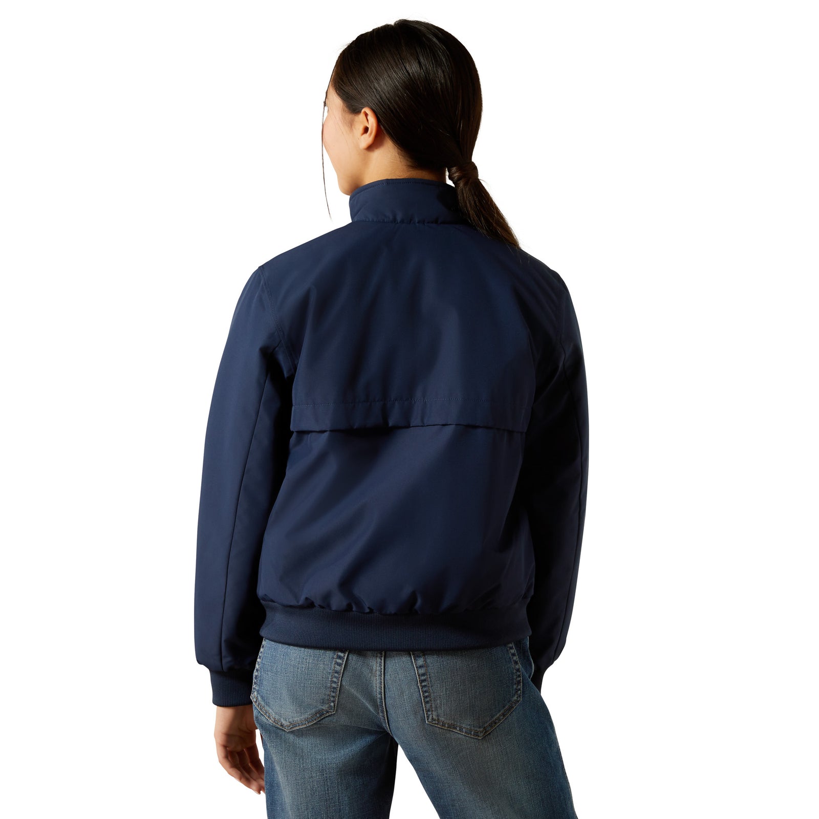 Person wearing a navy blue Ariat jacket on a white background