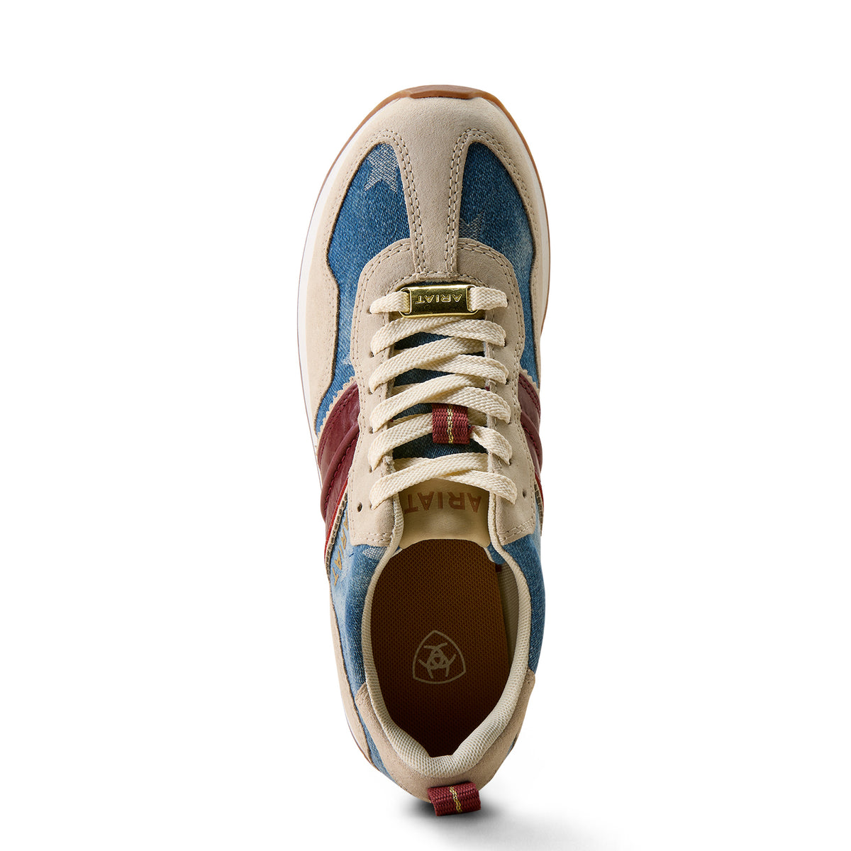 Sneaker with blue, red, and beige pattern on a white background