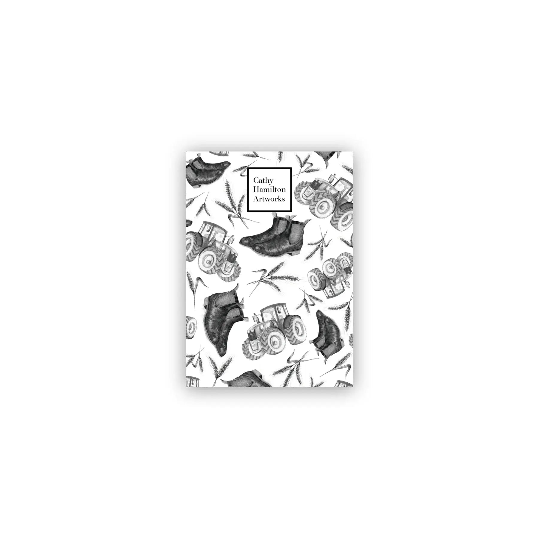 Farmers A6 Notepad. A black and white image of an A6 notepad with a farm-themed pattern including boots and farm equipment.