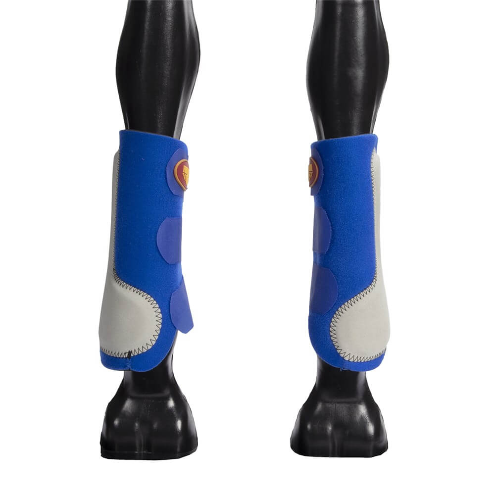 Fort Worth Easy Fit Splint Boots. A pair of blue Fort Worth splint boots on a horse's front legs, featuring Velcro straps and an extended leather patch.