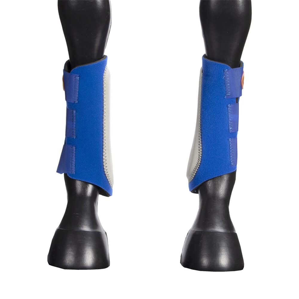 Fort Worth Easy Fit Splint Boots. A pair of blue Fort Worth splint boots on a horse's front legs, featuring Velcro straps and an extended leather patch.