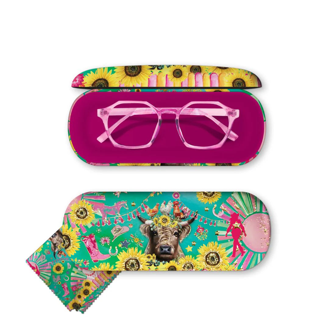 Lisa Pollock Carnival Cow Glasses Case. Colorful eyeglass case with a cow design on a white background