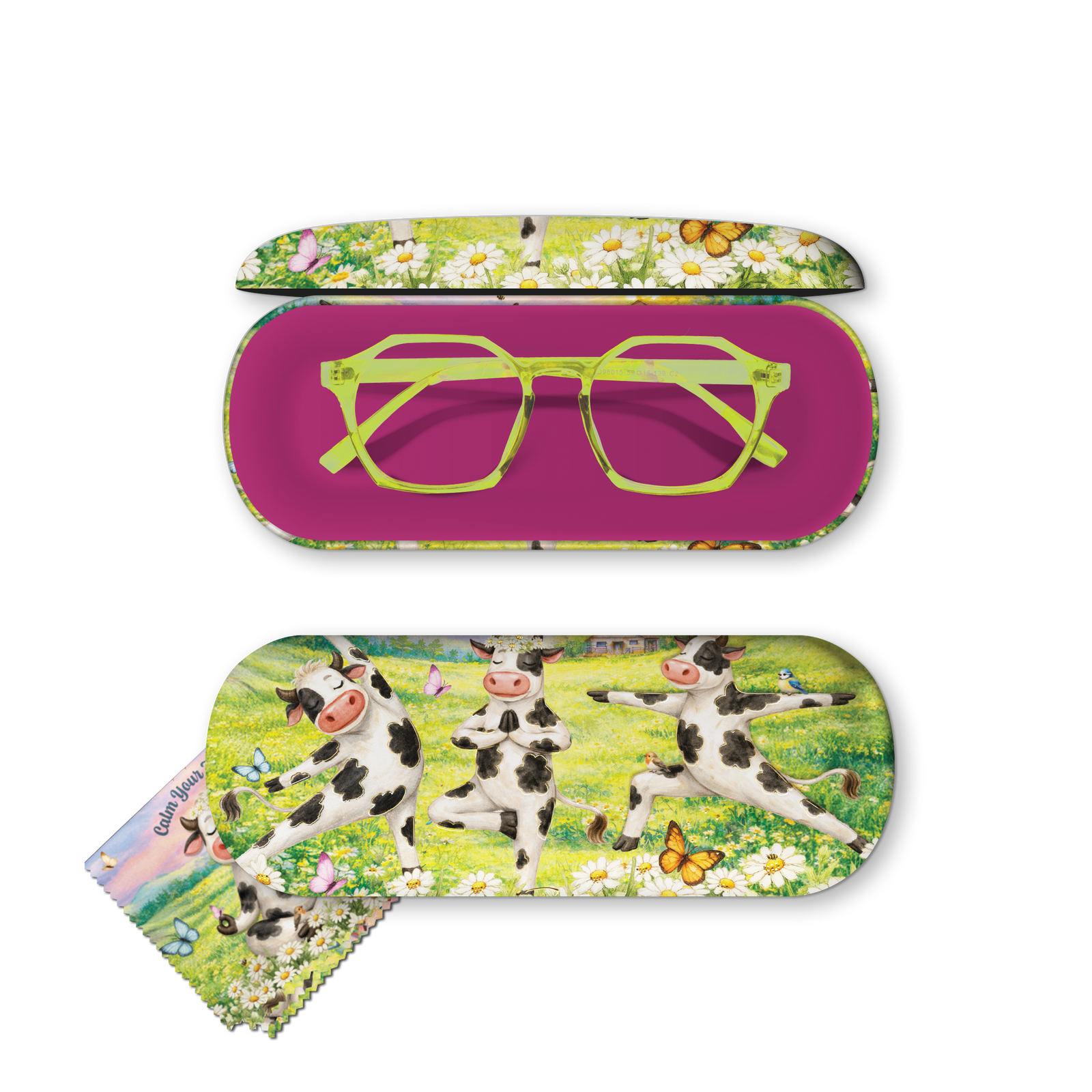 A pair of green eyeglasses displayed with their matching hard case and microfiber cloth. The case features a vibrant magenta interior and a colorful print of cows dancing in a grassy field with daisies and butterflies.