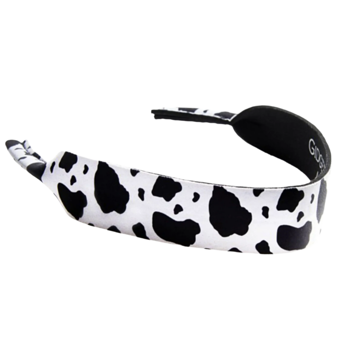 Gidgee Eyes Cow Print Sunglasses Strap. Black and white cow print headband with &#39;Globo&#39; branding on a white background