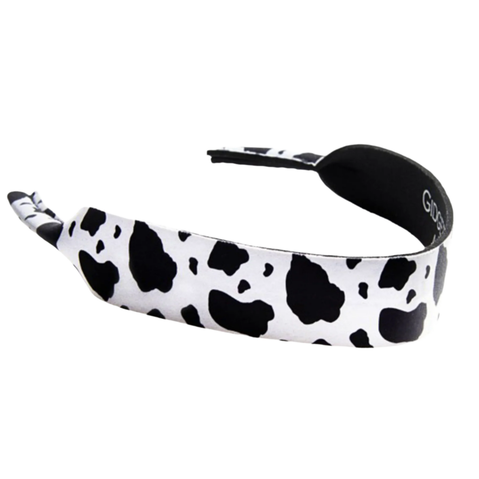 Gidgee Eyes Cow Print Sunglasses Strap. Black and white cow print headband with 'Globo' branding on a white background