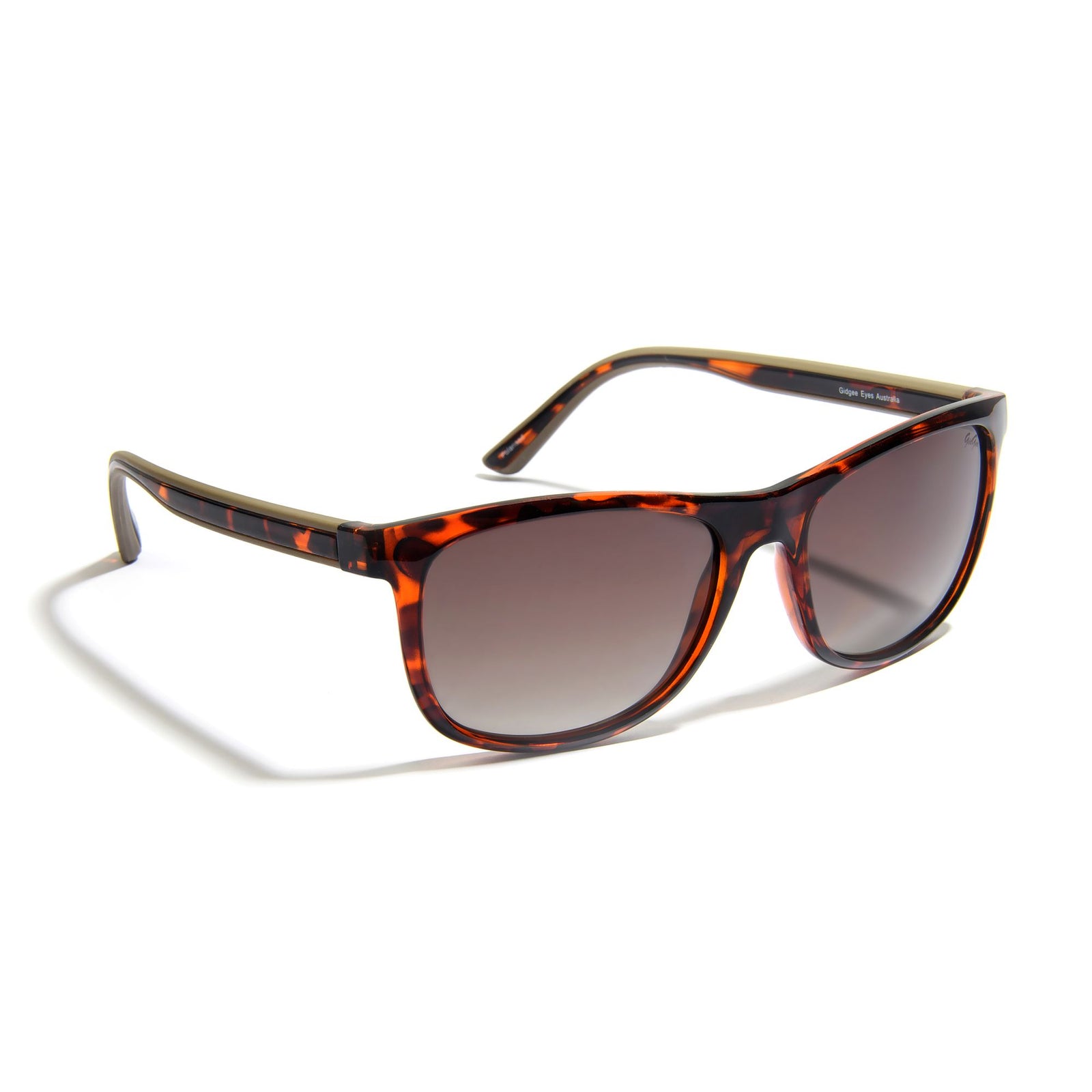 Gidgee Eyes Fender Amber Tort Sunglasses. A pair of Gidgee Eyes Fender Amber Tort Sunglasses with an amber tortoise shell pattern frame and polarized lenses.