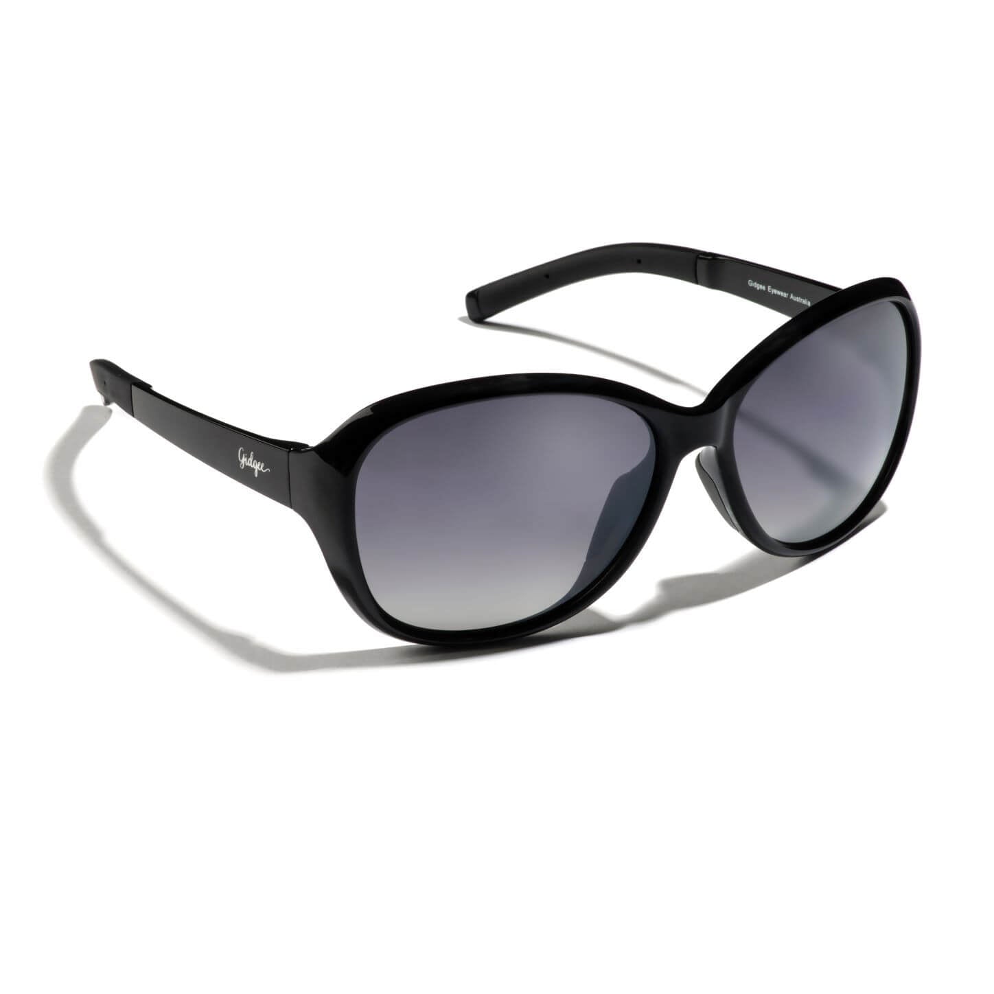 Gidgee Eyes Willow Black Sunglasses. A pair of black sunglasses with a sleek design and dark lenses.
