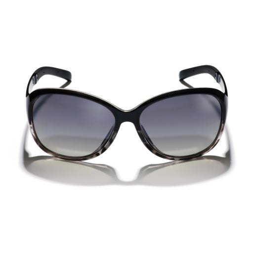 Gidgee Eyes Willow Dapple Sunglasses. A pair of Willow Dapple sunglasses featuring a two-tone black and grey dapple tortoise frame with polarized lenses.