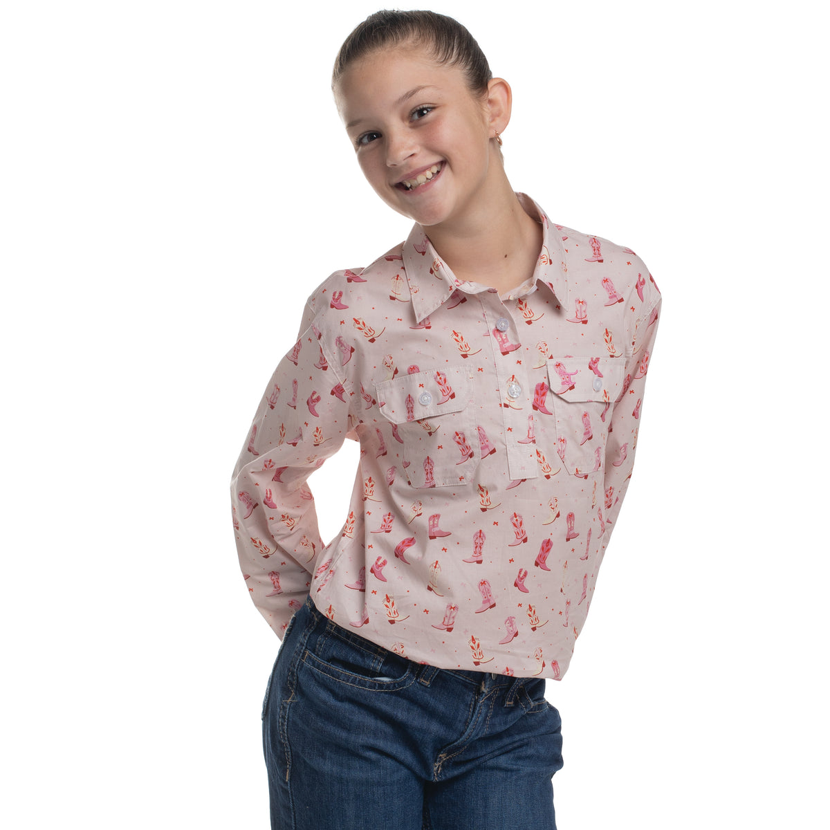 Girl wearing a patterned shirt and jeans on a white background