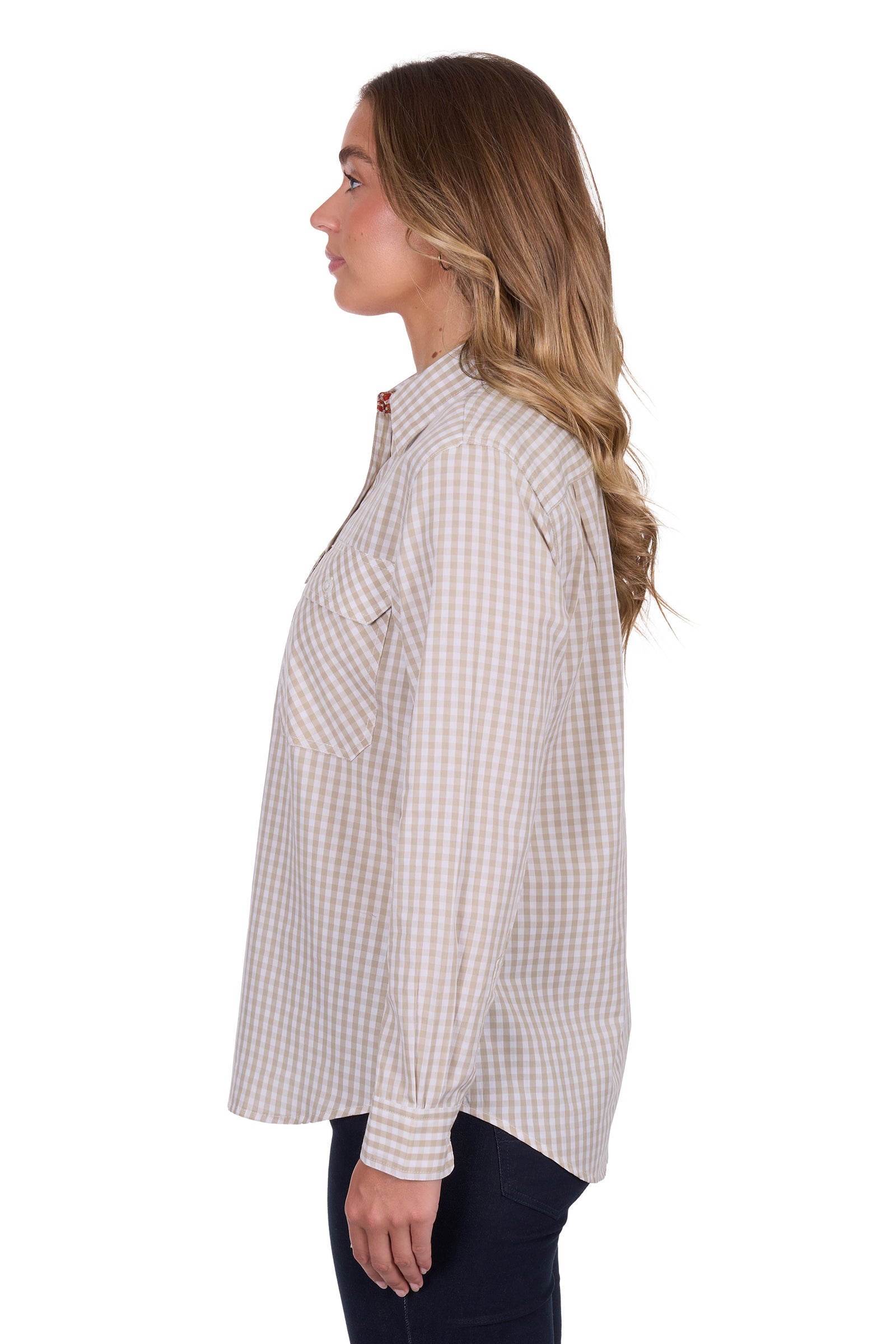 Hard Slog Women's Sara 1/2 Placket L/S Shirt. Woman wearing a plaid shirt on a white background