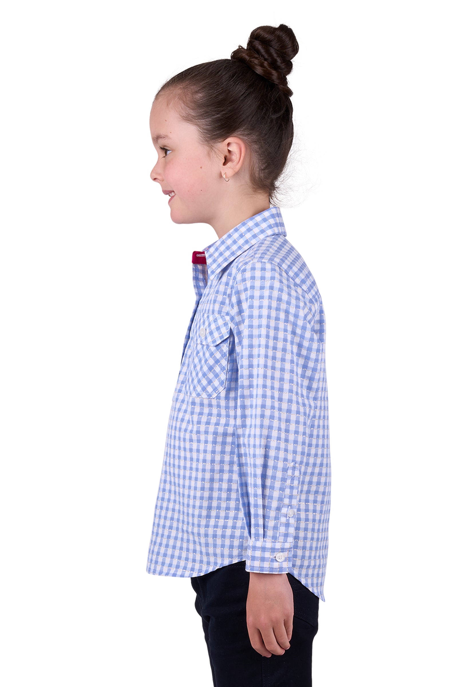 Hard Slog Girl's Rux 1/2 Placket L/S Shirt. A girl wearing a long sleeve blue and white checkered shirt with a half placket and pockets.