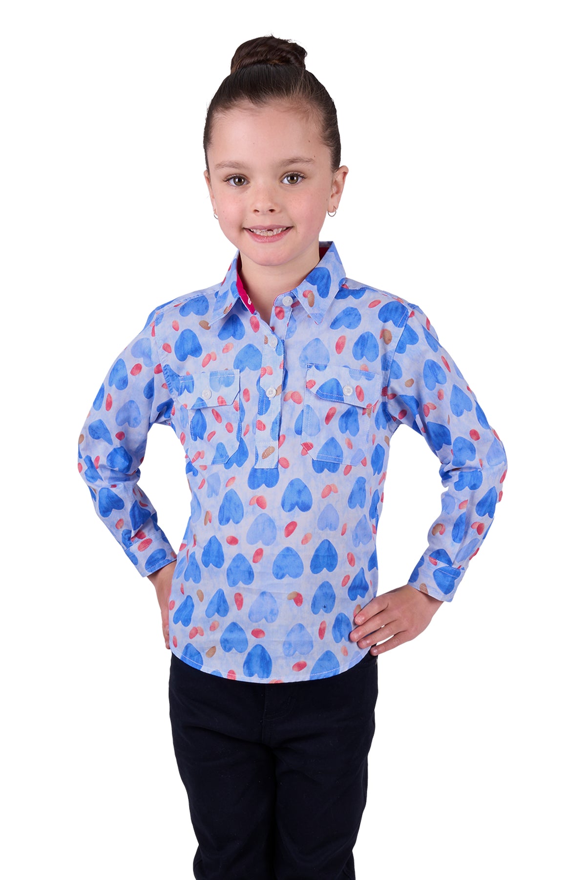 Hard Slog Girl's Miv 1/2 Placket L/S Shirt. A girl wearing a long sleeve shirt with a geometric heart pattern, predominantly blue with red and white accents, and a half placket collar.