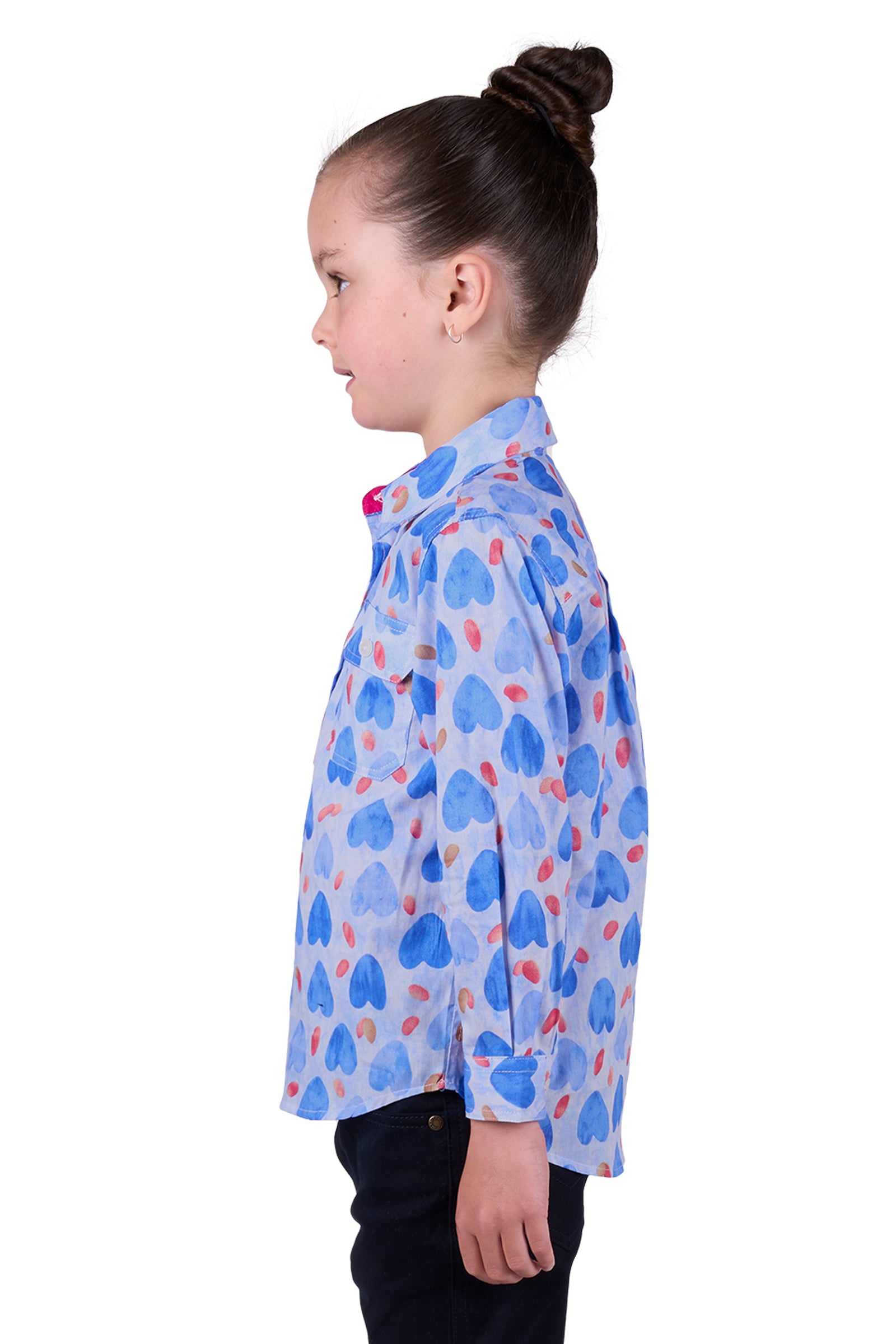 Hard Slog Girl's Miv 1/2 Placket L/S Shirt. A girl wearing a long sleeve shirt with a geometric heart pattern, predominantly blue with red and white accents, and a half placket collar.
