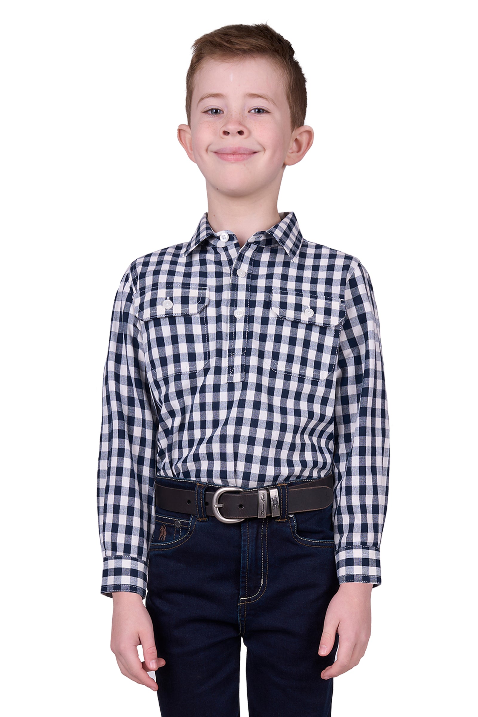 Hard Slog Boy's Dell 1/2 Placket L/S Shirt. A boy wearing a long sleeve checkered shirt with a half placket and logo buttons, paired with trousers and a belt.