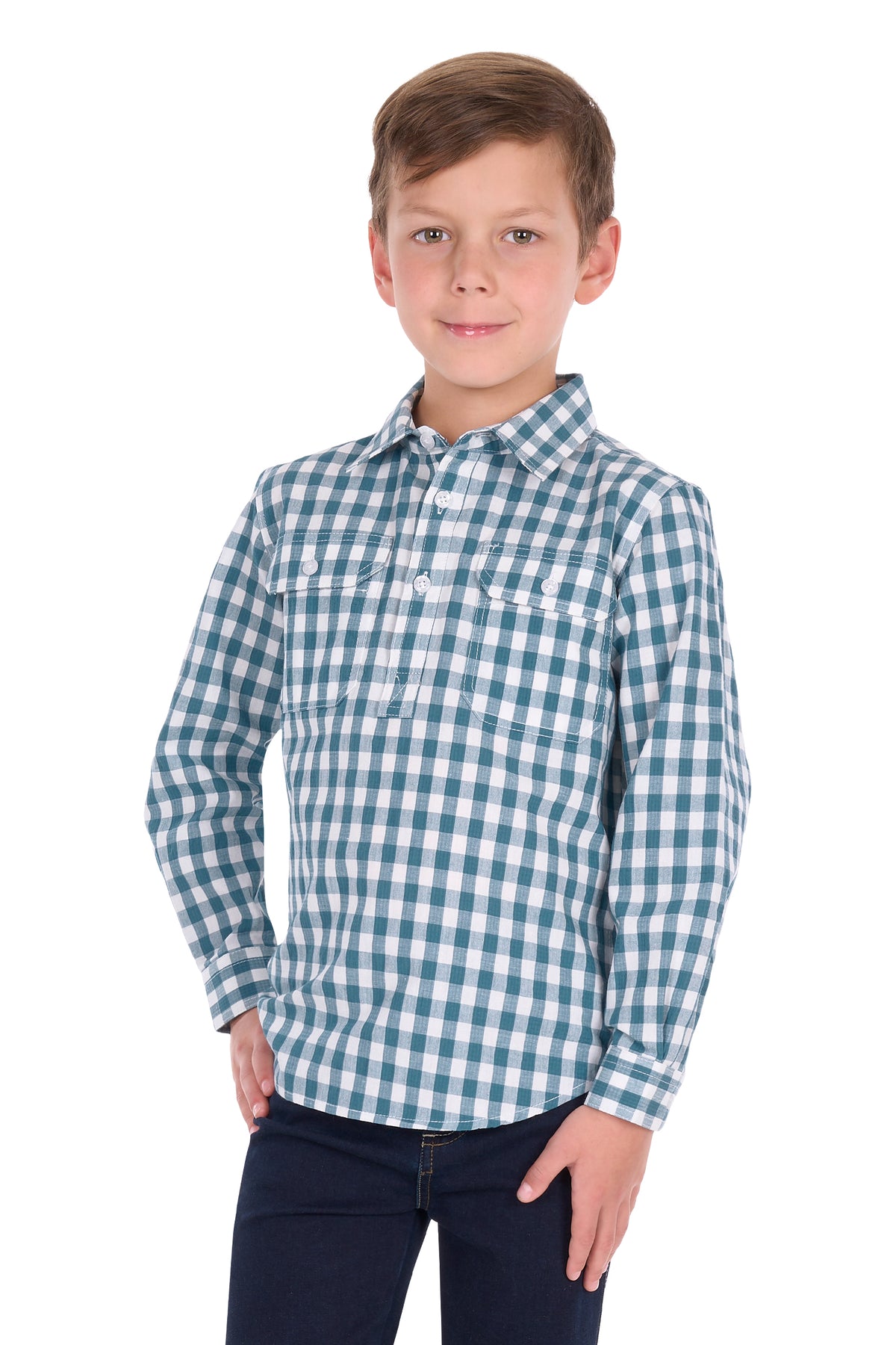 A young boy modeling a long-sleeve button-down shirt with a green and white gingham check pattern, paired with dark pants, against a plain white background.