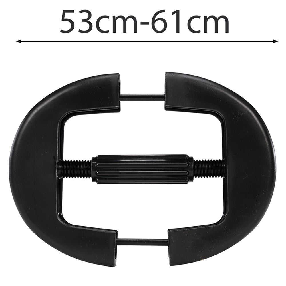 The Hat Retainer. Black C-clamp with measurement range 53cm-61cm on a white background
