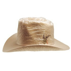 Western Hat Cover. A beige colored western hat cover made of clear vinyl material.