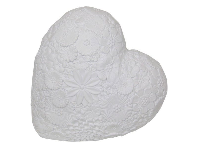 White Floral Heart. White textured heart-shaped object on a white background