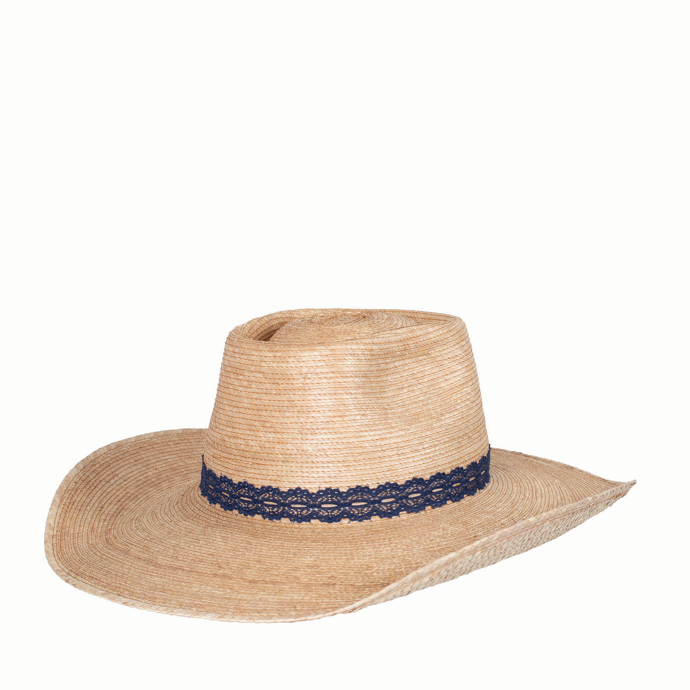 Straw hat with a navy lace band on a white background