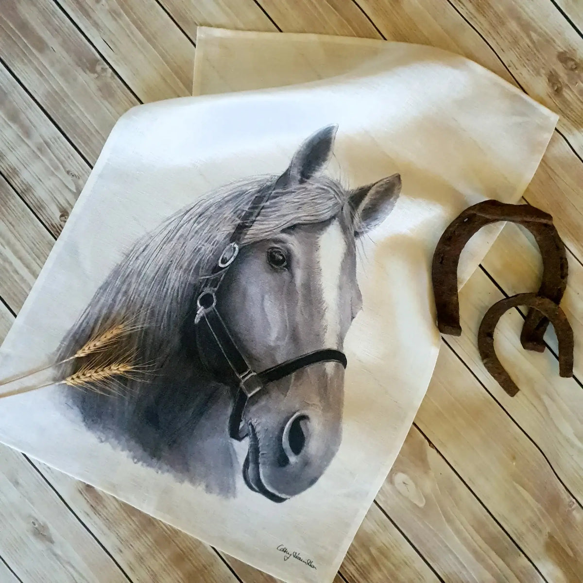 Horse Linen Tea Towel. A white linen tea towel with a central pencil-drawn illustration of a horse's head.